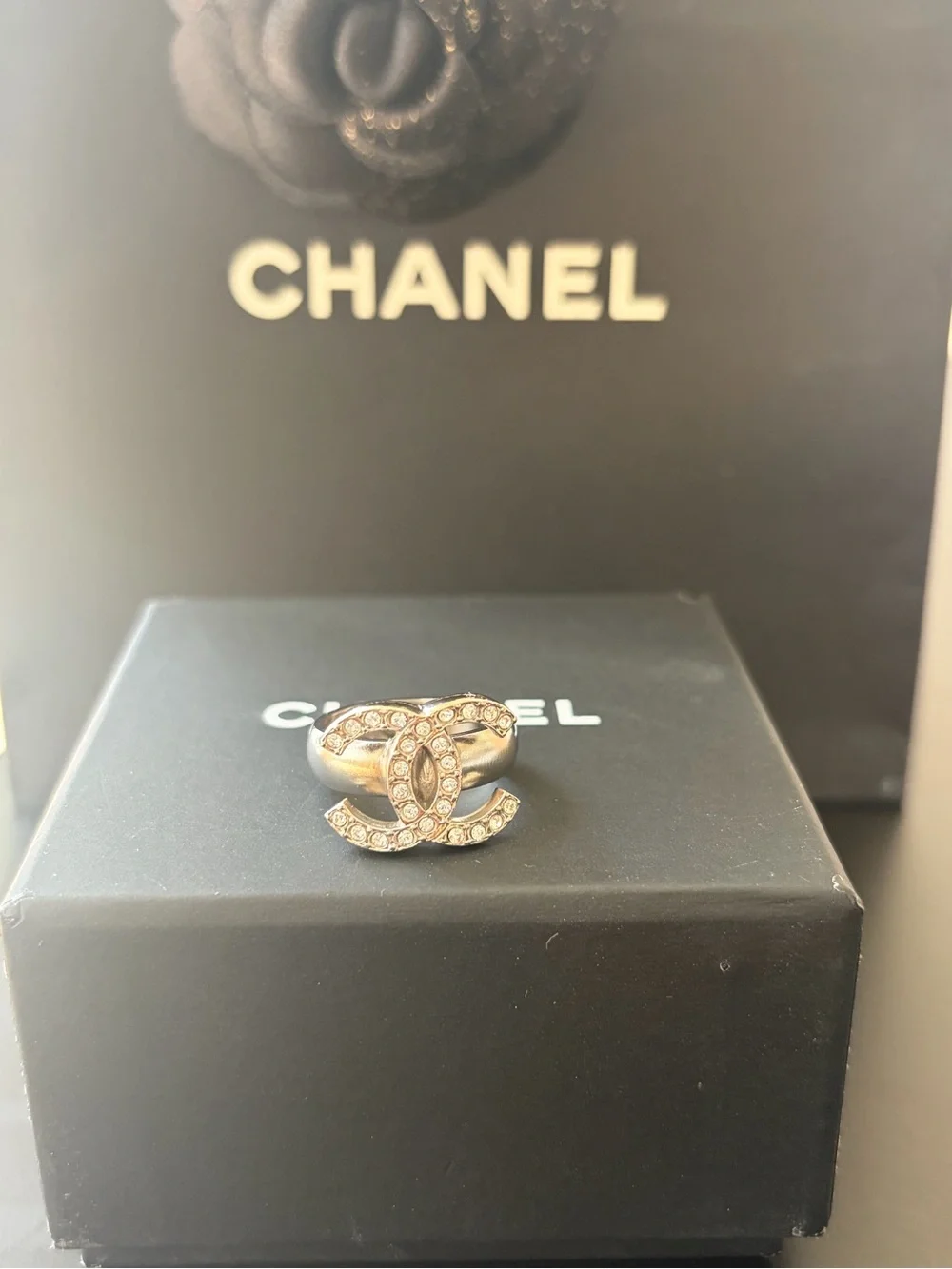 CHANEL ring showcasing
